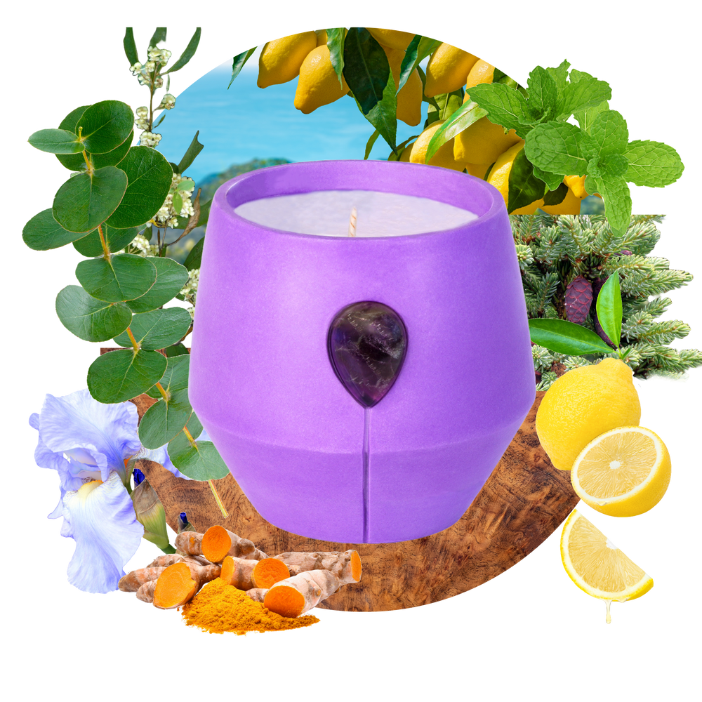 Image of Luna Iris candle with its scent collage at the back - the text reads: Wander through our enchanting lemon grove where soft pine and eucalyptus meet captivating black spruce. This scent is invigorating uplifting and brings peace.  Elevate your tranquility with our Amethyst adorned vessel in a vibrant purple colour.